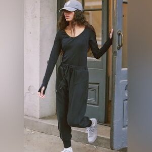 Free People Movement NWOT Make it Count Black Long Sleeve Jumpsuit size Small